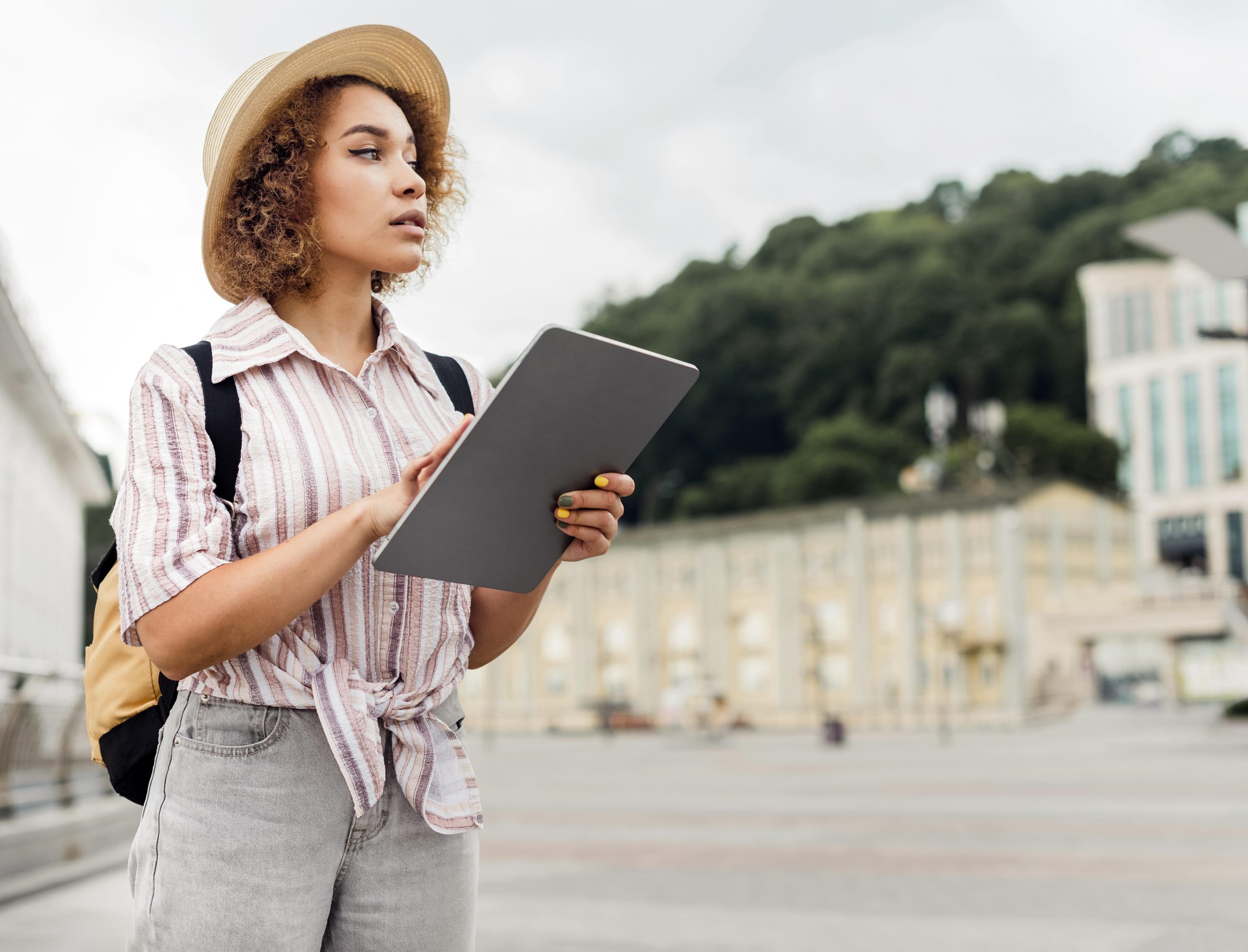 woman-checking-her-tablet-directions