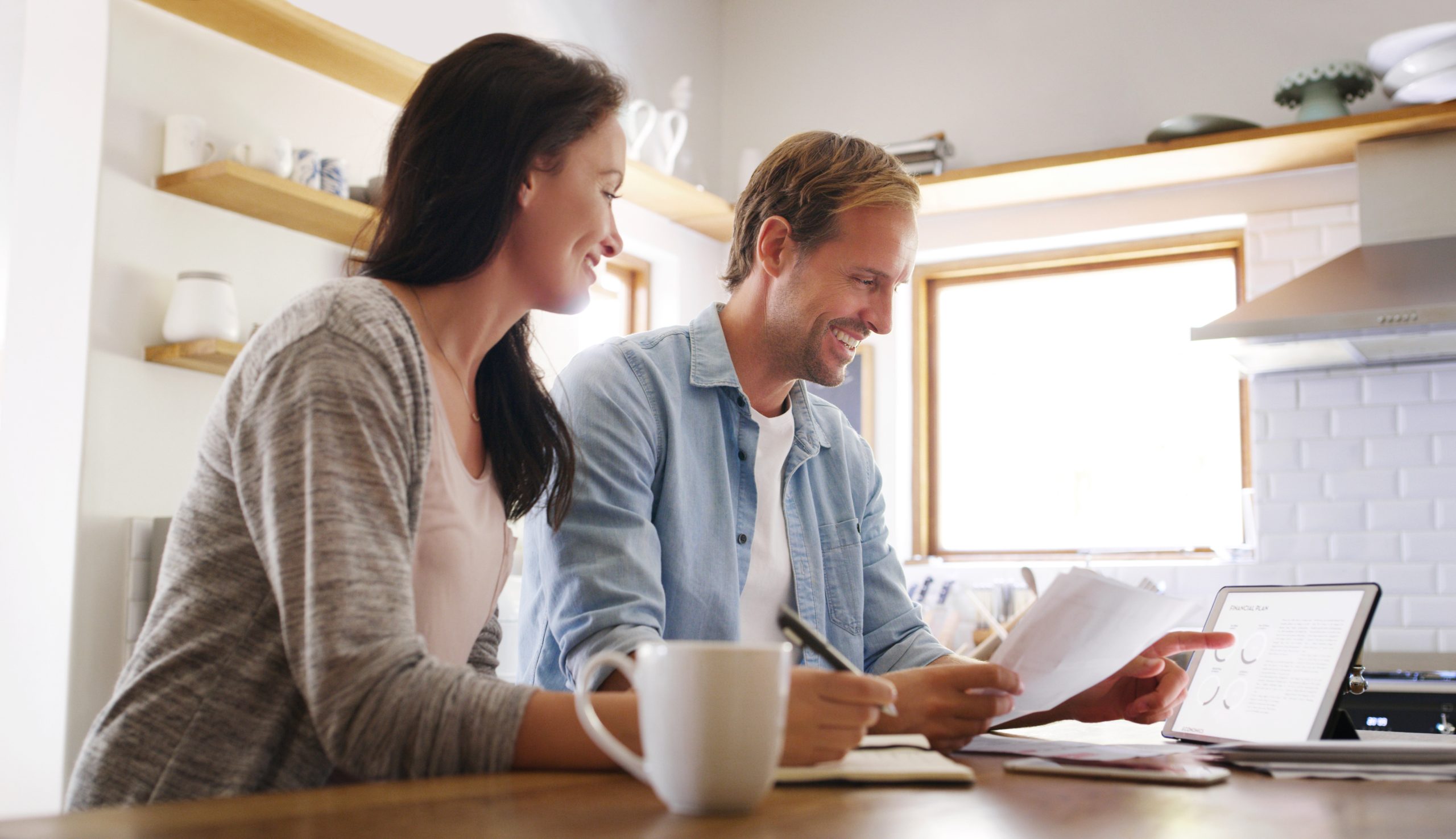 happy-couple-tablet-with-documents-online-payment-financial-savings-banking-website-smile-woman-man-with-digital-paperwork-mortgage-information-loan-application-house