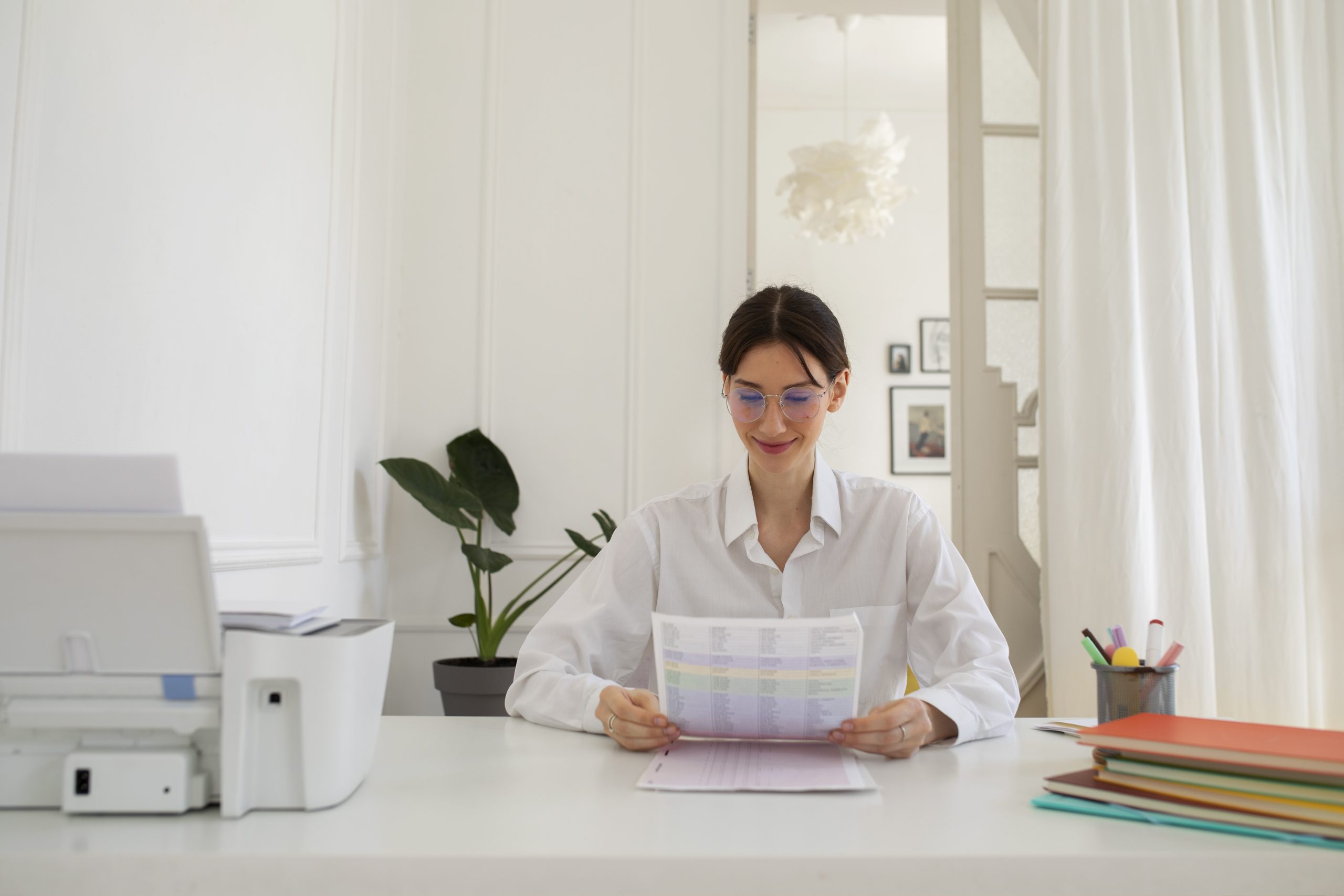 front-view-woman-holding-documents