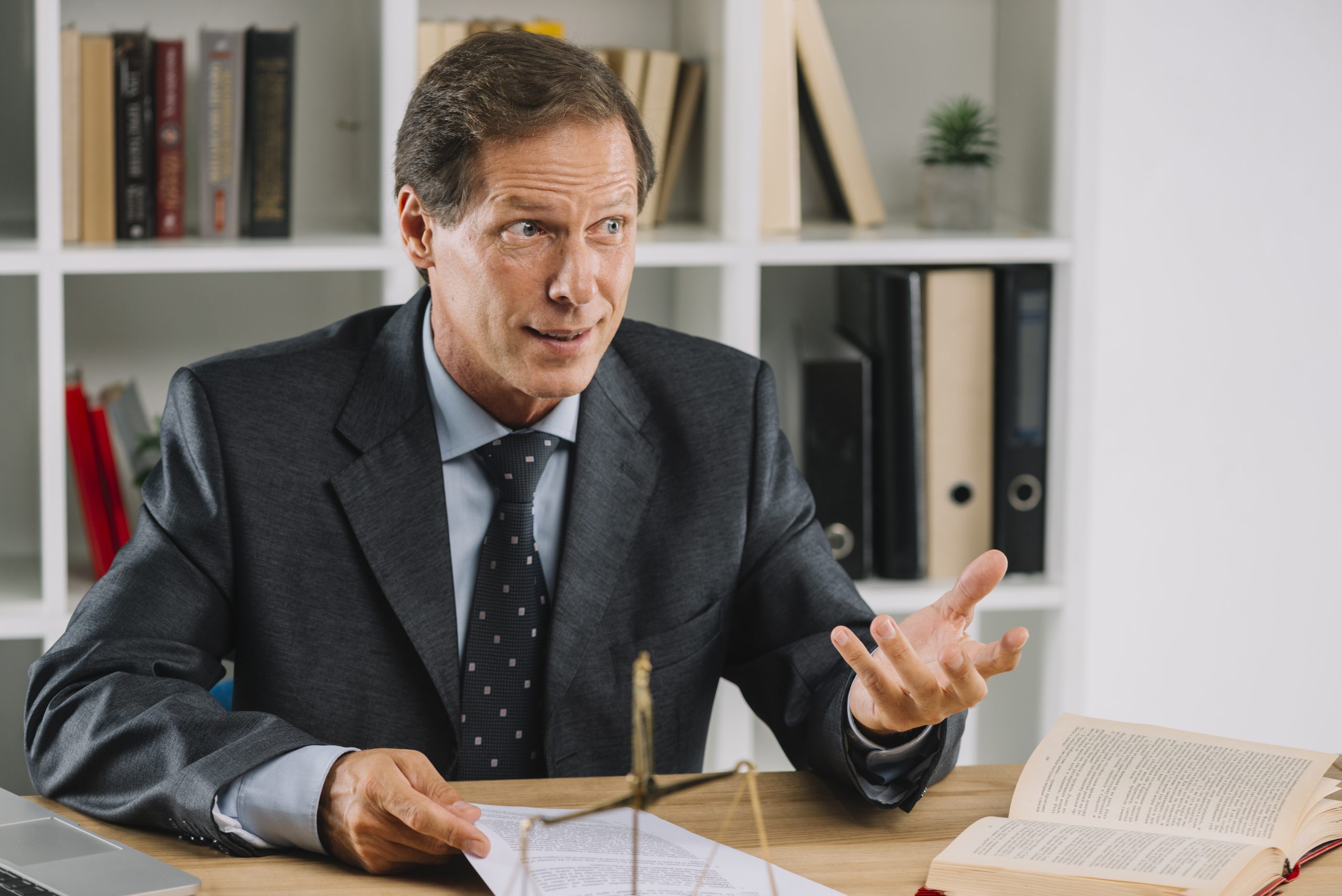 mature-lawyer-having-conversation-court-room